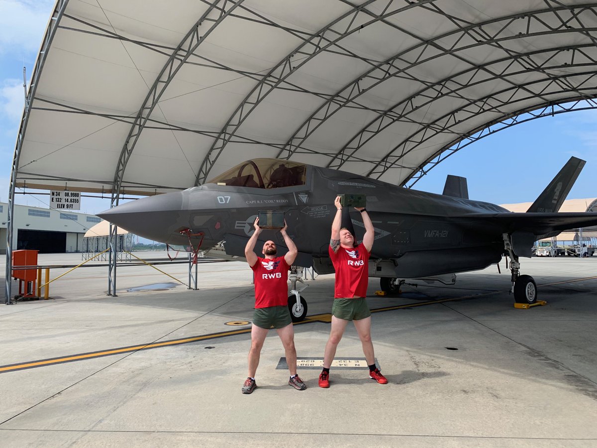 TeamRWB's tweet photo. There's no better backdrop for the #1776Challenge than an F-35B from VMFA-121 in Iwakuni, Japan! Check out these epic Eagles getting their push presses in and staying active while on duty! https://t.co/nsuJ1QXVUH