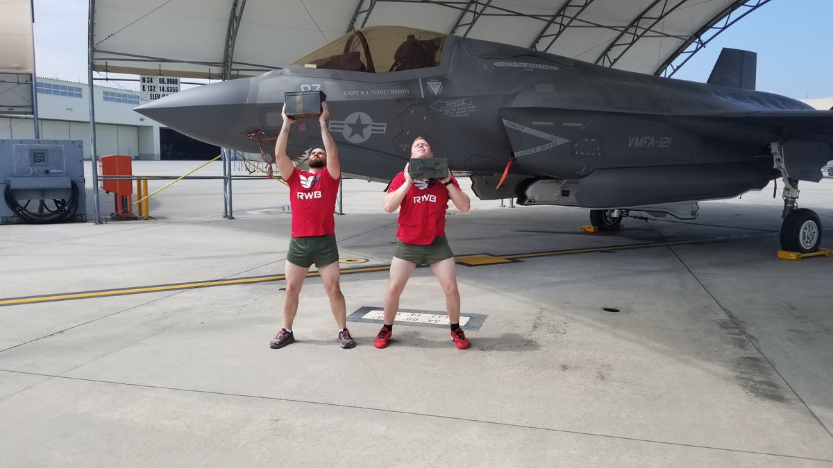 TeamRWB's tweet photo. There's no better backdrop for the #1776Challenge than an F-35B from VMFA-121 in Iwakuni, Japan! Check out these epic Eagles getting their push presses in and staying active while on duty! https://t.co/nsuJ1QXVUH