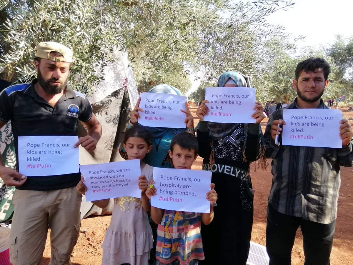 ThomasVLinge's tweet photo. #Syria: Syrian civilians in #Idlib are picturing themselves with messages for Pope Francis, who is set to meet President #Putin on Thursday. https://t.co/DdnqeEuBSp