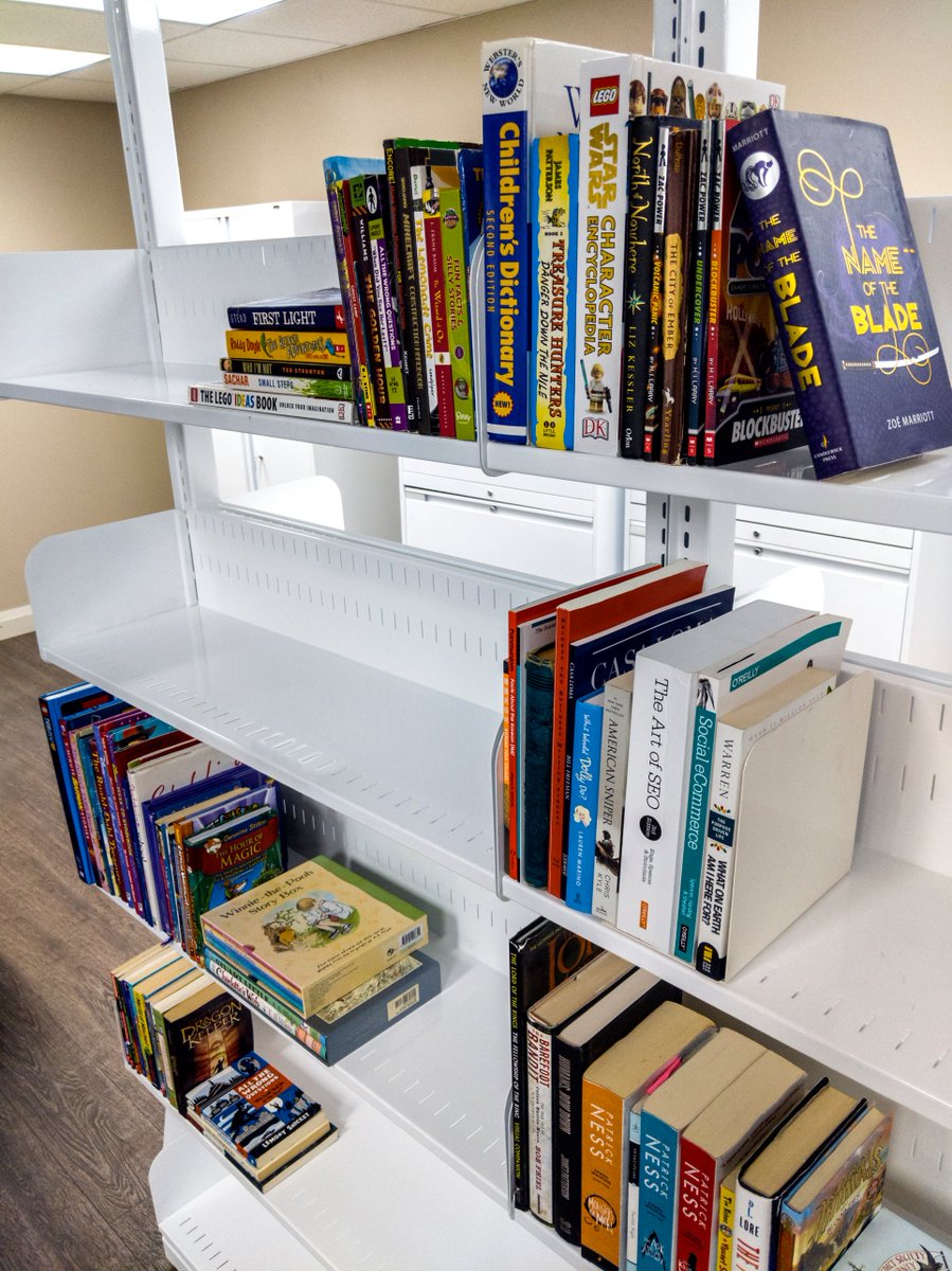 spacefile's tweet image. Modern Libraries prefer Cantilever shelving.  These stylish, modular units make it easy to display books, multi-media, magazines, &amp;amp; more.  Available in Mobile carriages or Static units in multiple heights, widths, and depths.  #librarystorage #storagesolutions #cantilever