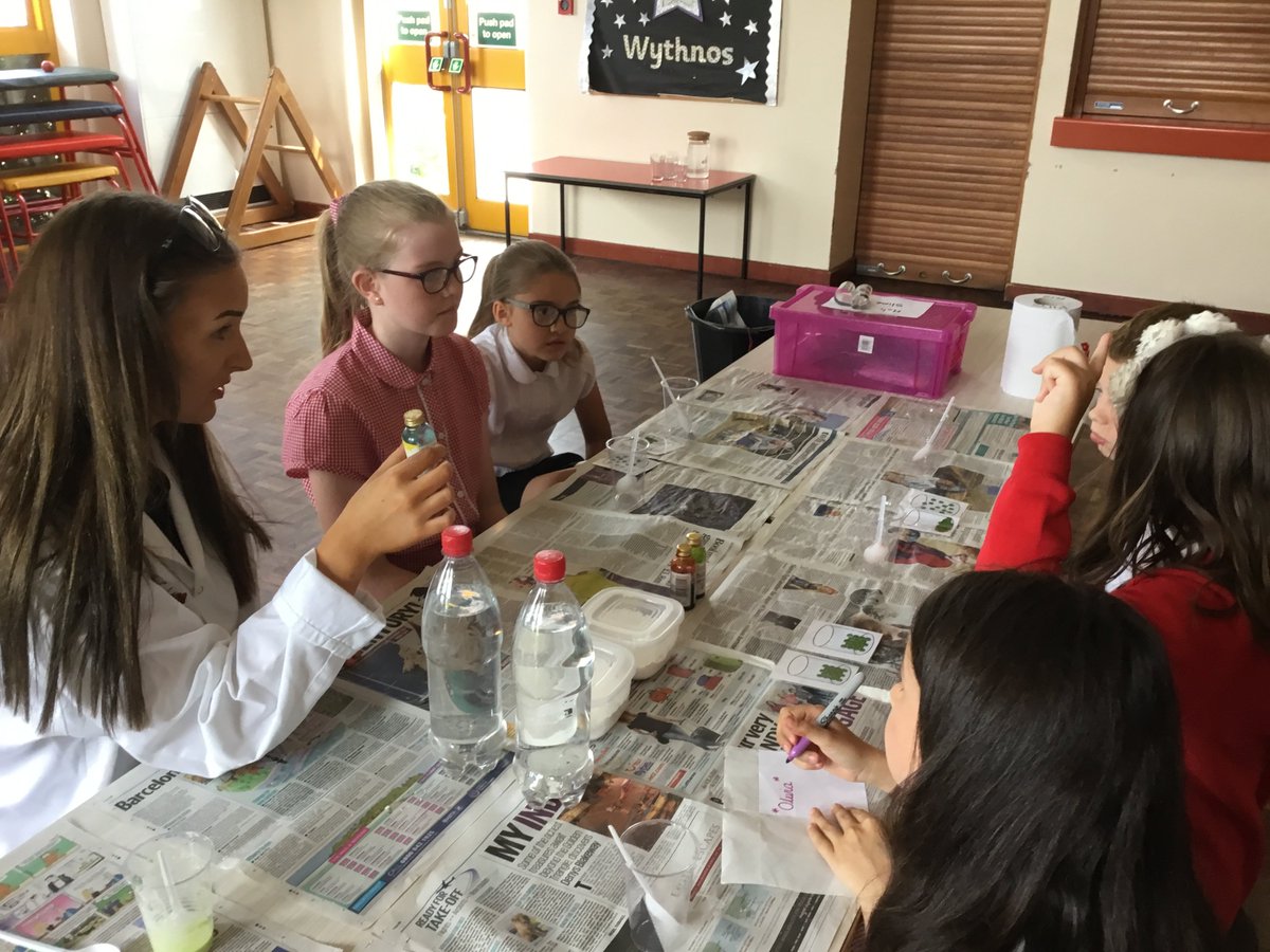 Stfagansadmin's tweet photo. Year 5 having fun trying out experiments with the Sixth form students from @HowellsSchool @stfagansMrsB @stfagansMrsC https://t.co/ofFp7zut6A