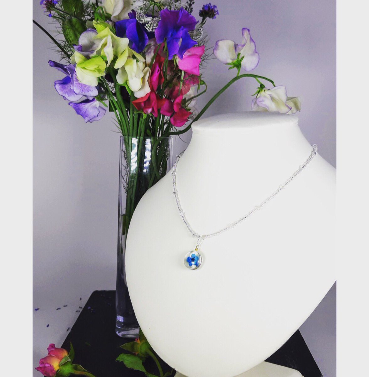 Now available.. #Handmade #Crystal #Necklace featuring a glass #Pendant with a #Blue #DriedFlower #JewelleryByKellyJane #HandmadeJewellery #InspiredByNature #MotherNature #FloralNecklace #FloralJewellery #Shaftesbury #Flowers #MadeWithLove jewellerybykellyjane.com/shop/necklace-…