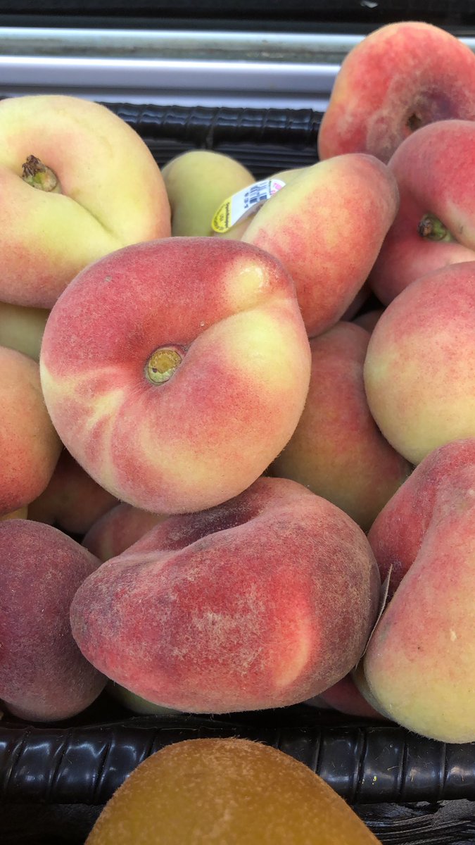 Some new arrivals in produce today. Doughnut peaches and kiwis. We also have pluots, black plums, rhubarb, apricots, sea beans, and both green and red grapes!