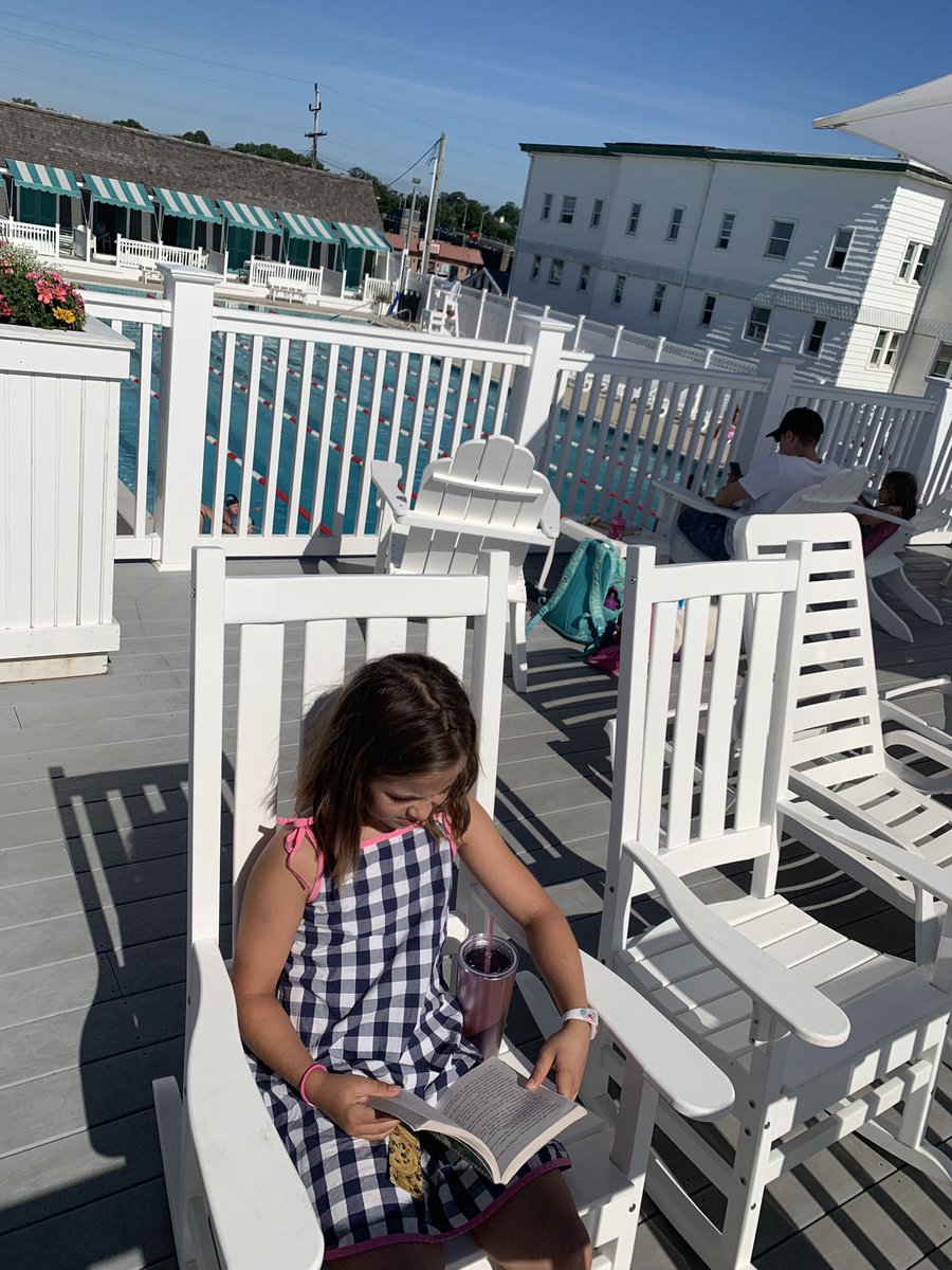 While waiting for her sister’s swim practice to finish @RPPrincipal #RPfamily reading at the beach