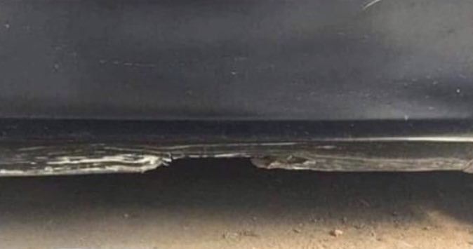 Is this a picture of a beach or a car door?