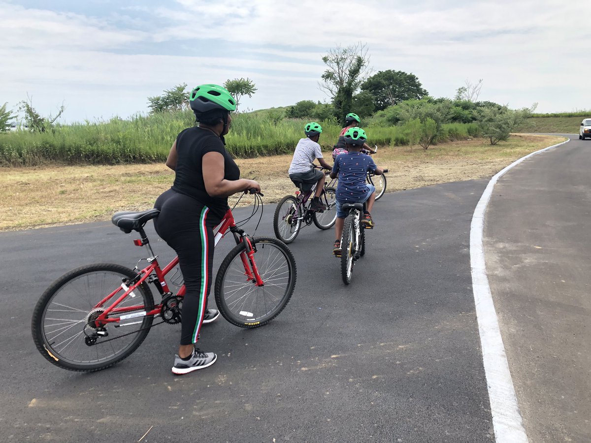 bikenewyork's tweet image. The #BikeLibrary is up and rolling! Annette Brown and her family are the first patrons!!! They’re off to explore #ShirleyChisholm State Park.