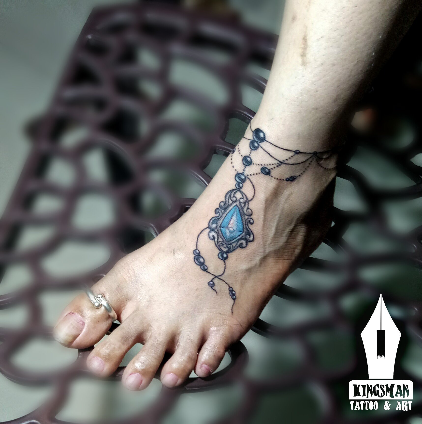 Tattoo uploaded by Jonny Wild • #charmbracelet #ankletattoo #anklet •  Tattoodo