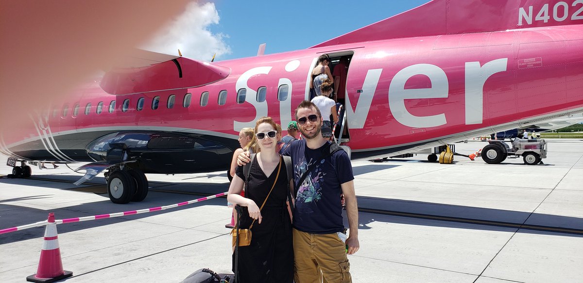 OverBoredGaming's tweet photo. We're on our way back home - loving the pink Silver Airways planes. We'll always have the image of the nice guy's finger to remember the trip by! https://t.co/LY4rPBUJyn
