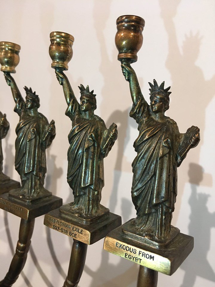As the Fourth of July approaches, we are highlighting two museum objects associated with the history of Jewish immigration to America. This Hanukkah lamp by Manfred Anson features candle holders cast from a Statue of Liberty souvenir, tying an American symbol of freedom to (1/3)