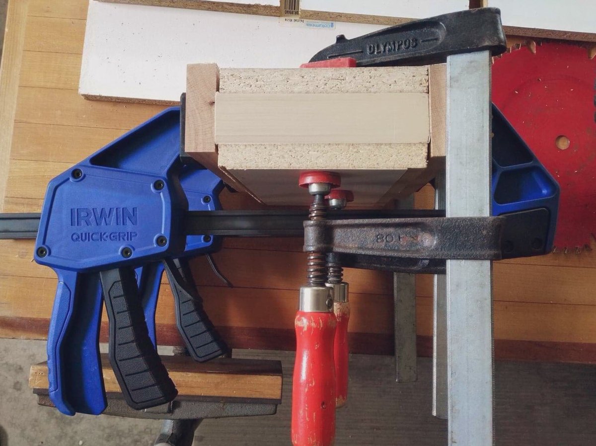 When I was home, Mom bought me a used #book, which was in rough shape. I asked #Dad to clamp it (with like, one clamp). Four pieces of wood and five clamps later... #problemsolving #dadsrock And Mom too. ❤️#booklover #amreading