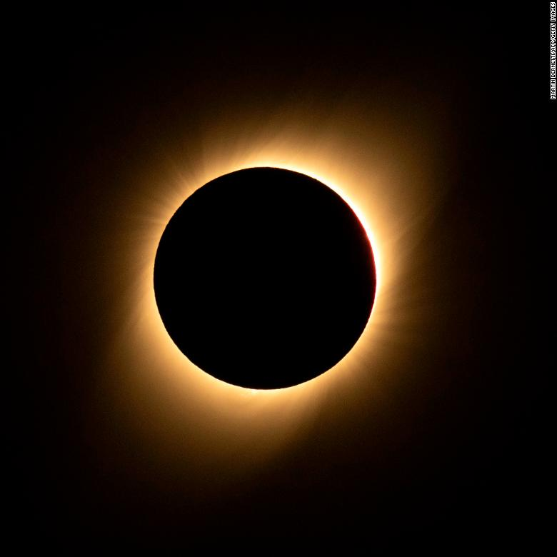 CNN's tweet photo. A total solar eclipse was visible in South America just after 4:30 p.m. ET. Viewers in parts of Chile and Argentina witnessed a stunning transformation of the sky as day turned to night and the moon progressively blocked the sun. https://t.co/6Li5lg9Len https://t.co/rTdKAm3V3X