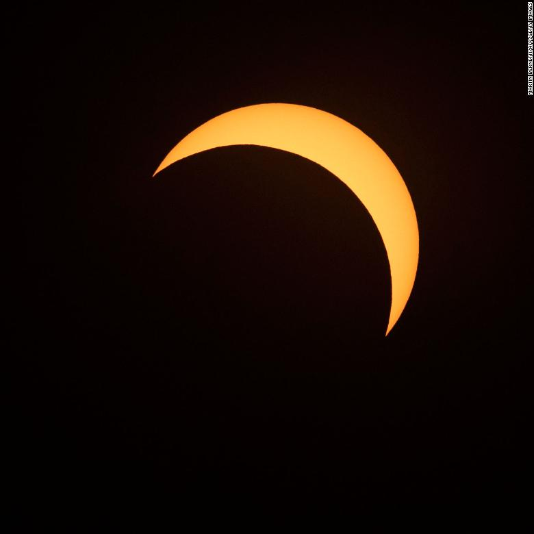 CNN's tweet photo. A total solar eclipse was visible in South America just after 4:30 p.m. ET. Viewers in parts of Chile and Argentina witnessed a stunning transformation of the sky as day turned to night and the moon progressively blocked the sun. https://t.co/6Li5lg9Len https://t.co/rTdKAm3V3X