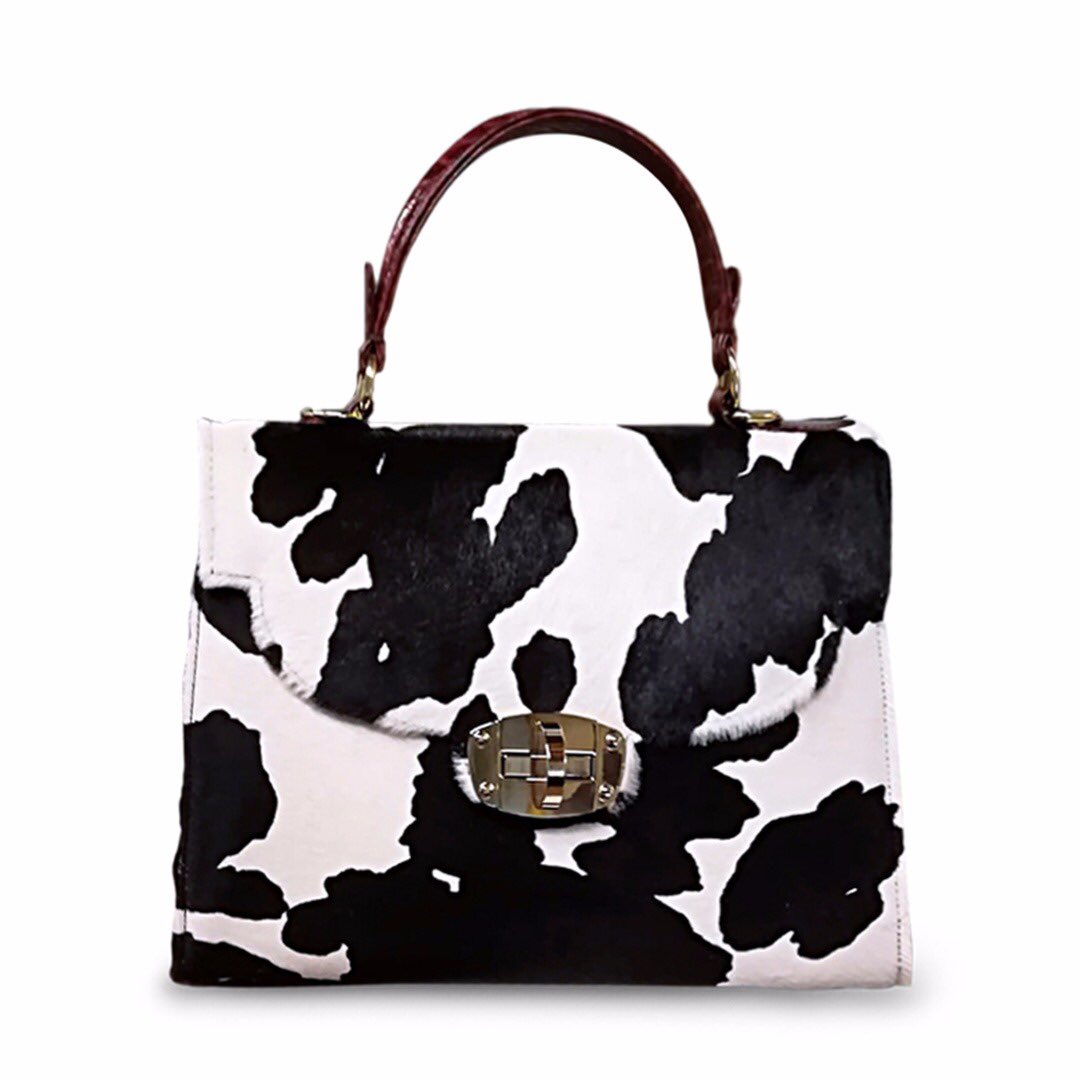 CataleyaLondon's tweet photo. Monochrome 🖤🖤🖤 #handbags #bags #style #mycataleya #madeinitaly #cowprint #fashionstylist https://t.co/wgh4gLxBqu