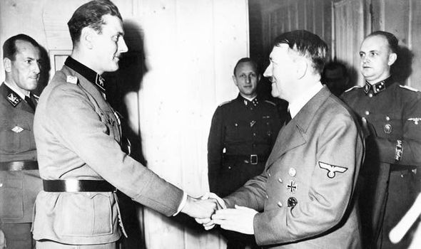 145) This is Otto Skorzeny, Adolf Hitler's bodyguard, and a favorite... A guerrilla warfare specialist...AKA "The most dangerous man in Europe..."