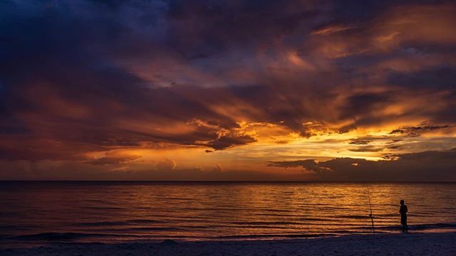 gregnphoto's tweet photo. Naples twilight after thunderstorms had passed by. Had to ask Jonathan the fisherman not to move due to the long exposure.  #naples #naplesbeach #naplesphotography #naplesfl https://t.co/MlxaEEqcrx https://t.co/95F1t7UVA5