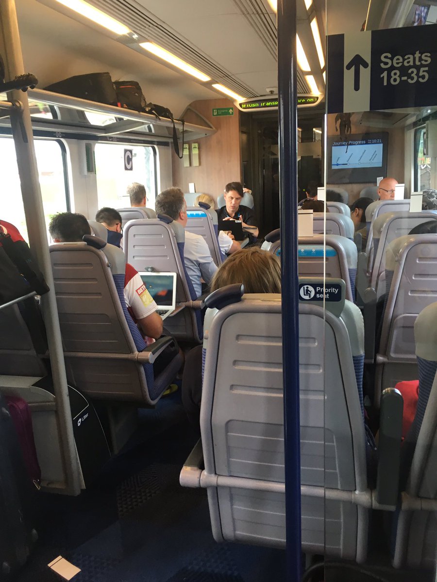 Slumming it in cattle class with the commoners. Standing room only... no wonder everybody drives