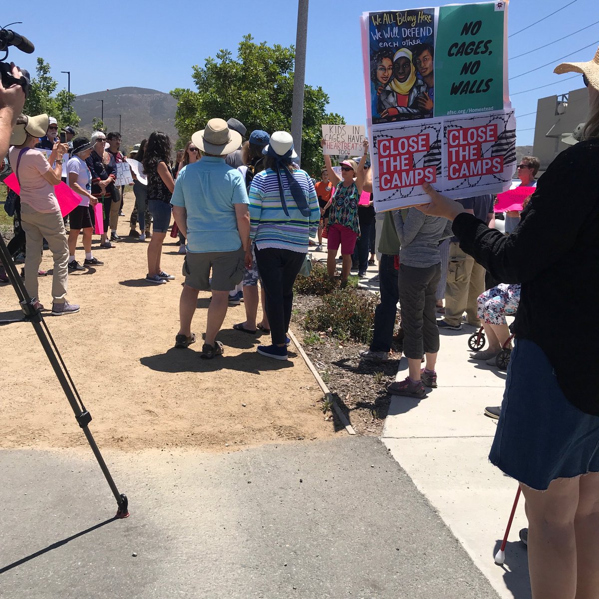 TransPrideSD's tweet image. At Core Civic yesterday, Otay Mesa Detention Center, ⁦@MoveOn⁩ event protesting the illegal detention and tortuous conditions for migrants and refugees. #free them #now! I’d rather my #tax dollars go to helping people resettle than @potus BS oligarchic #parade 🤕