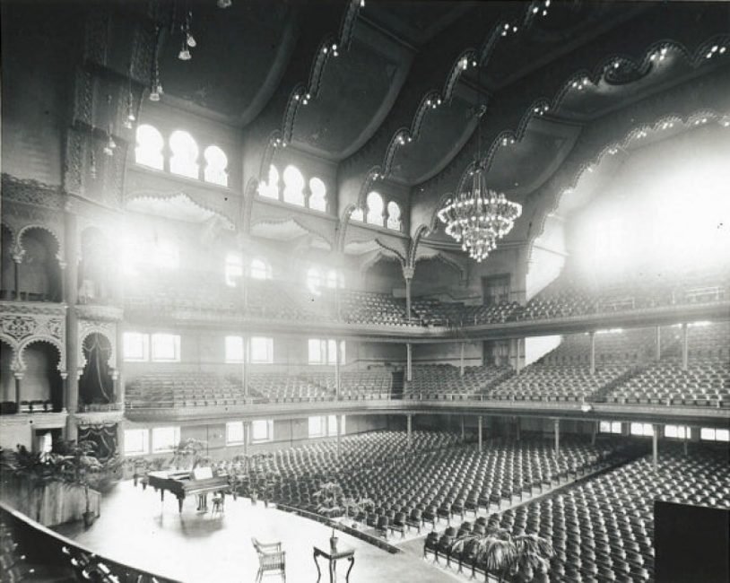 dgtroop's tweet photo. Fun fact about the "fly loft" in this article.  These were originally side boxes for patrons to view over the stage - this one at gallery level.  Circa 1910 these boxes were altered, first for organ pipes, then for a fly loft.  Sides boxes visible at far left of the photo. https://t.co/qoI2MegELu