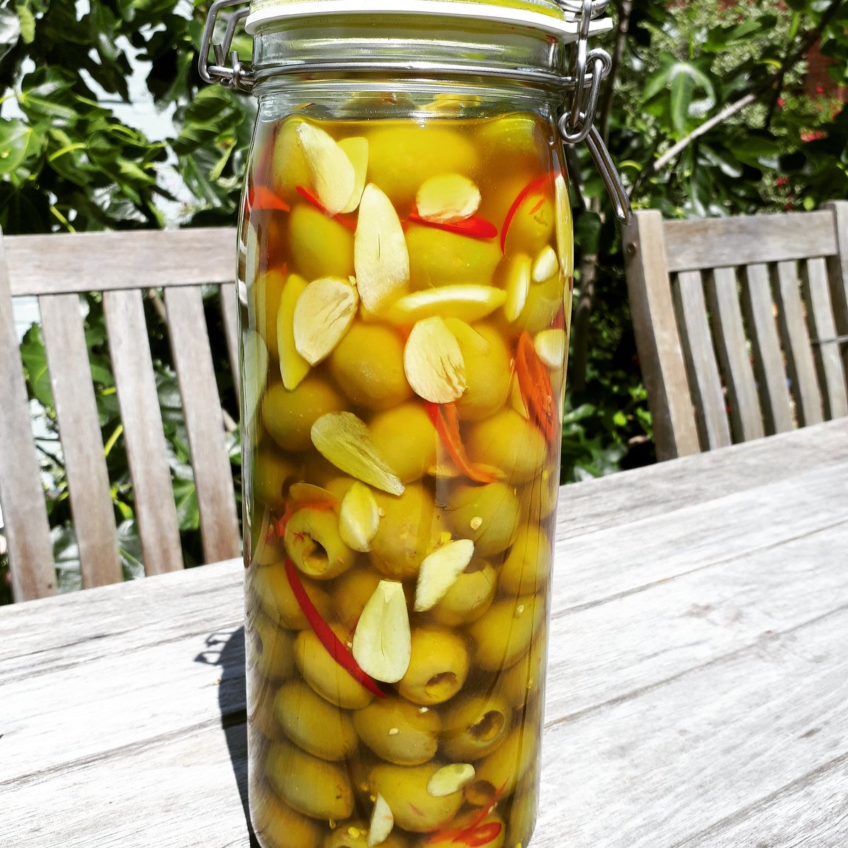 Now ready. Marinated in a beautiful extra virgin olive oil. Gordita olives, delicious in their own right, these have been marinated in <a href="/TheGarlicFarm/">The Garlic Farm</a> Extra Early Wight garlic and red chillis. Yummy.