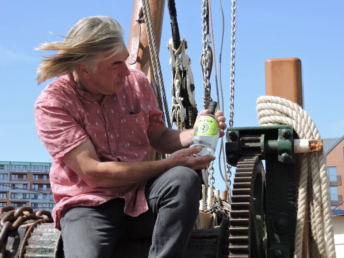 ipswich_pr's tweet photo. Rob, skipper of the Thistle Thames barge seems to have found something he likes😉   Looks like the new Limey Gin. https://t.co/MzHyoaW26p #limeygin https://t.co/8ZFal8p59x