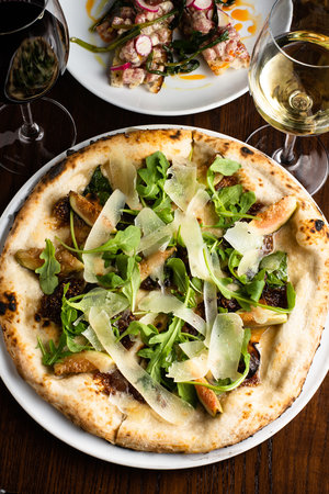 A match made in heaven. Pair a glass of organically produced Piemonte with our farm-fresh fig pizza for #WineWednesday!
