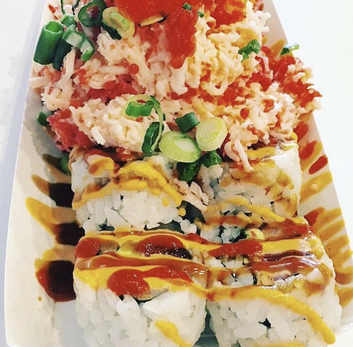 Wrap your bite around this loaded  <a href="/rollbotto/">Rollbotto Sushi</a> sushi roll covered with delicious sauces and toppings! #sushi #rollbotto #dtsp #downtownstpete #stpete  #vspc #kspl #igerstpete #iheartstpete #ilovetheburg #theburg