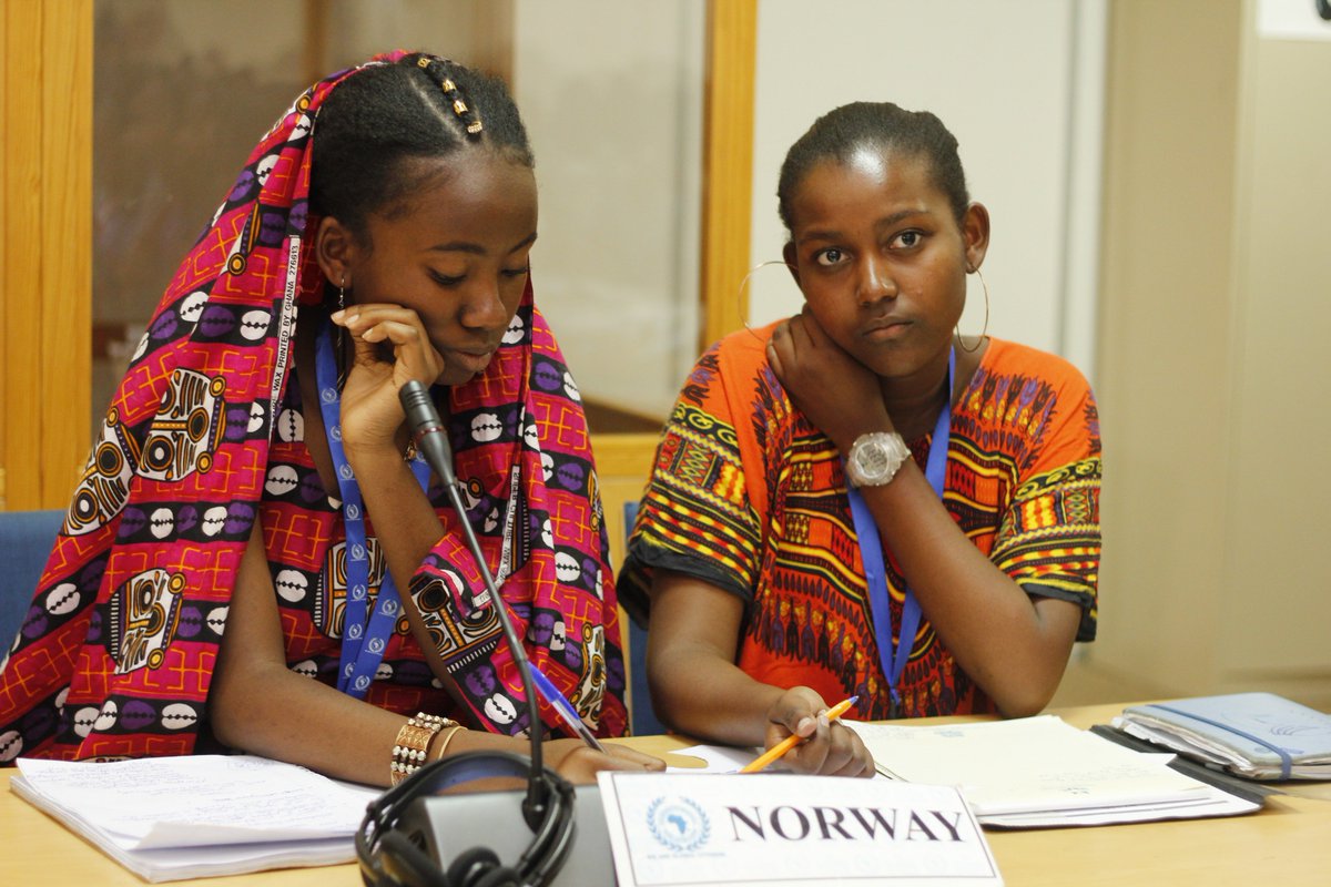 subsaharanmun's tweet photo. Delegates from Ethiopia and Norway respectively following discussions keenly earlier today during #ECOSOP committee deliberations on accommodating the youth in the fight against poverty.@unicnairobi
#SDG1
#SDGs
#SAIMUN19
#SAIMUNXP
#YouthLeadership
#GlobalCitizens https://t.co/bLDoWnAe6q
