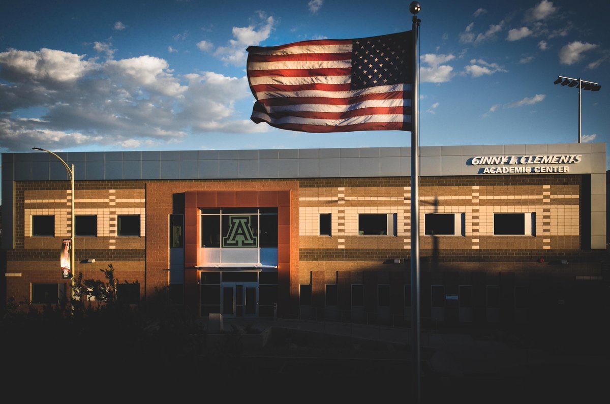 wildcatphotog's tweet image. The sun sets on #OldGlory and the @CATSAcademics Ginny Clements Center.