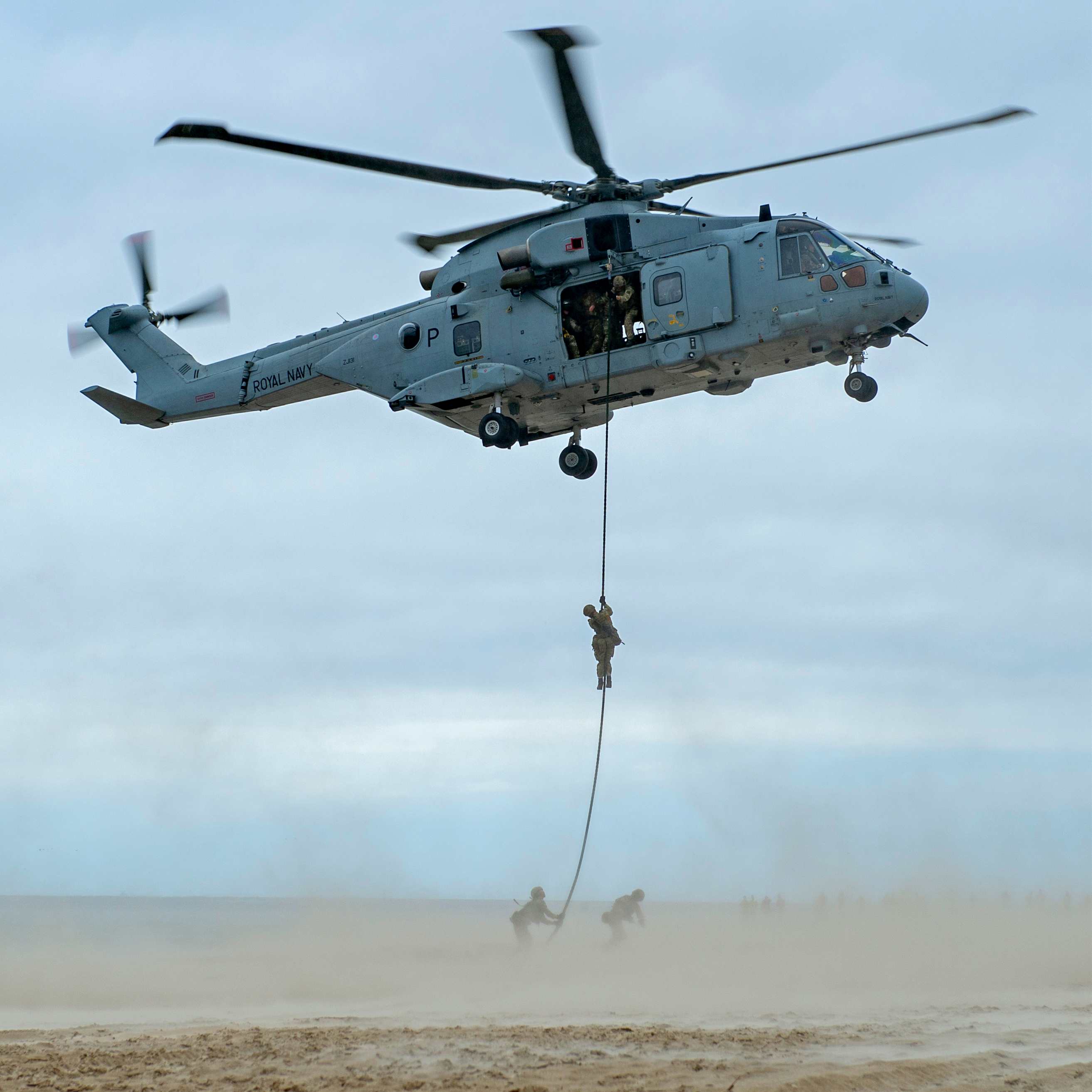 Military Machine on X: British Royal Marines fast rope from a
