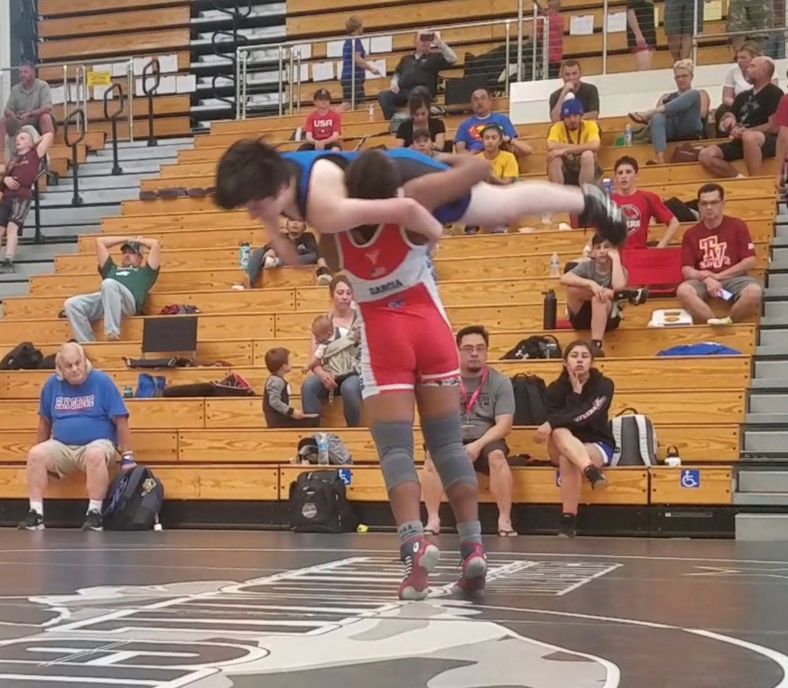 RadGarciaUSH's tweet photo. My little 8th grader at a high school wrestling tournament. Can't wait to see her in high school Oh Yeah! #TheyAllMustFall https://t.co/FQy1EAe1DV