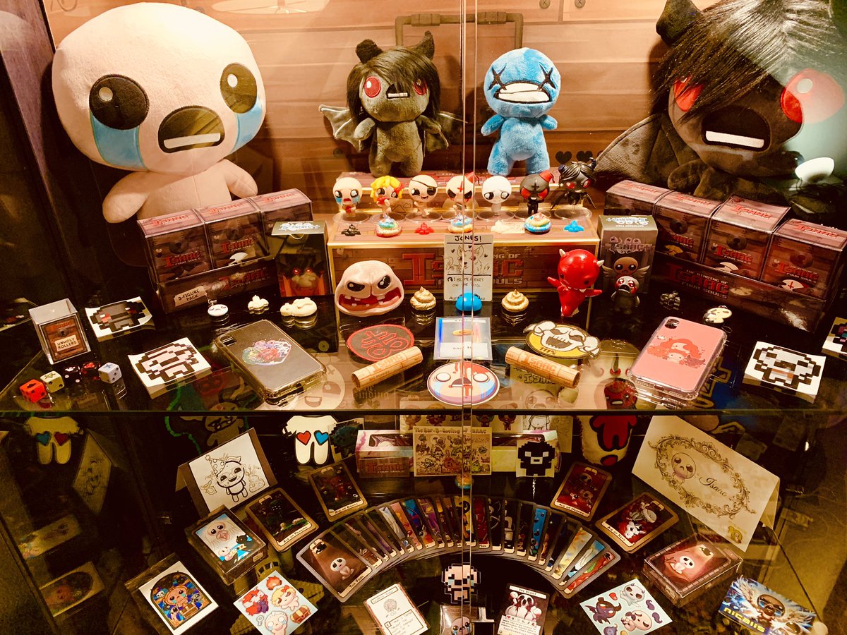 The Isaac curio cabinet is looking pretty fresh with a few new additions and the play mats mounted as a backdrop! <a href="/edmundmcmillen/">🜏 Edmund McMillen 🜏</a>
