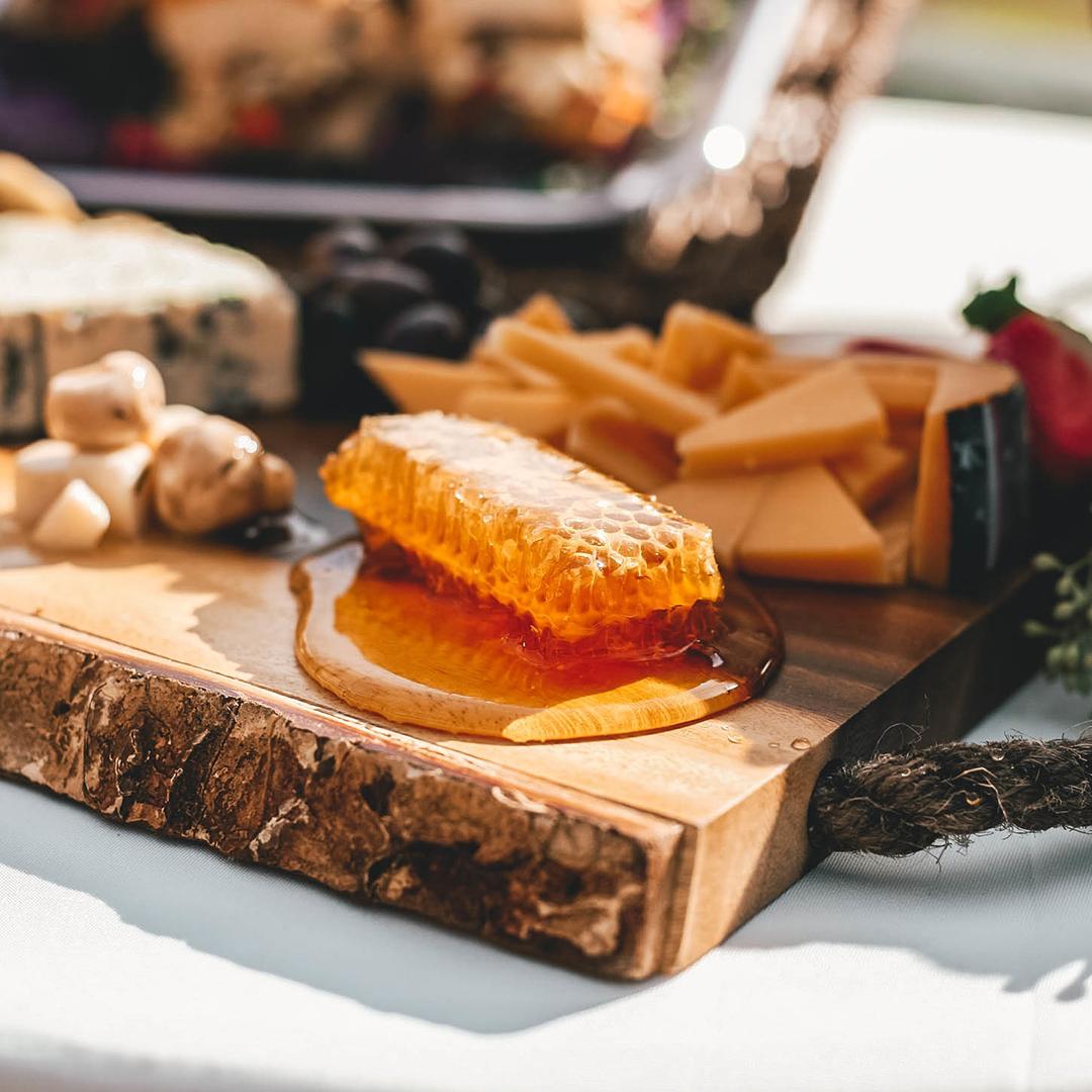 If you’re hosting a dinner party or setting out a midday snack, consider adding honeycomb to a charcuterie board. Get some cheese, crackers, a selection of cured meats, nuts, fruit, and add a chunk of honeycomb to your spread to impress your guests.