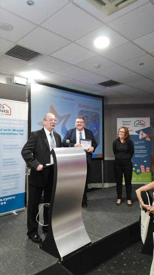 Mon_Housing's tweet photo. Our fantastic tenant @emlynlunn was crowned the Welsh Tenant of the Year for their Tenant Engagement and community volunteering at the @Tpasawards2019  TPAS Cymru  Participation Awards last night. Well deserved recognition of all his hard work. @TPASCymru  #notallheroeswearcapes https://t.co/taXH4x6Ba0