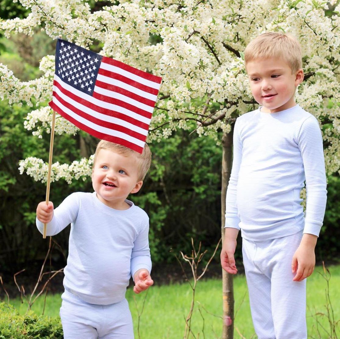 Happy 4th of July!!🇺🇸 We love this patriotic pic from @lapetiteplum of her Kissy Kissy cuties in their matching pjs!💙 #kissykissybaby #4thofjuly