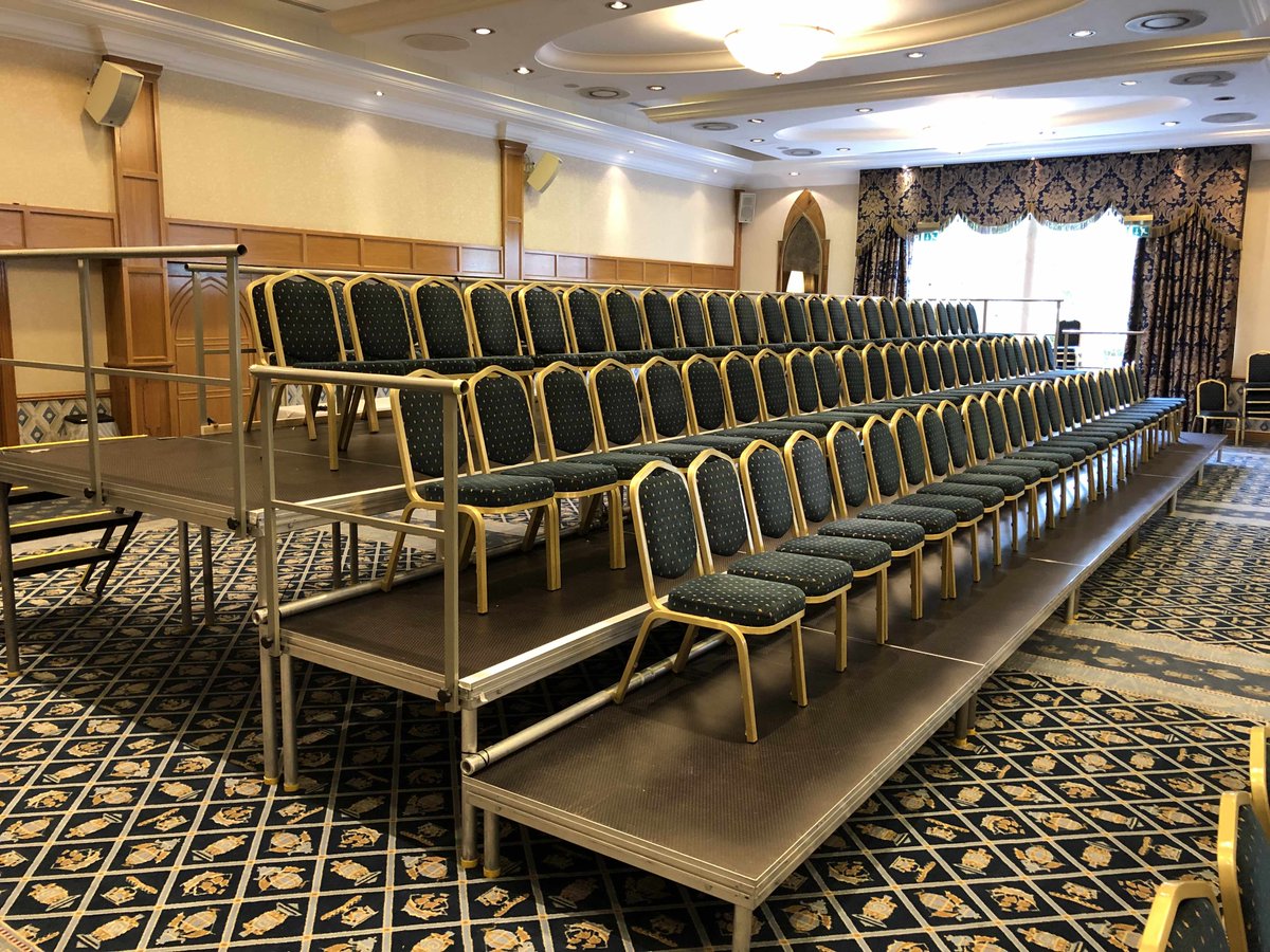StagemenUK's tweet photo. Tiered seating &amp; staging for your event, conference, concert, sporting events, performing arts &amp; festival. Bespoke design &amp; build to suit your venue &amp; event. Contact us for more details. https://t.co/HGBLcxN4ii #tieredseating #tieredstaging #tieredstaginghire #staginghire #seats https://t.co/Bui3iKMmEN