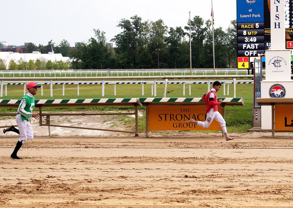 LaurelPark's tweet photo. And they’re off...in a foot race. Angel Cruz takes the #PDJF Jockey Dash! #LaurelPark https://t.co/tZuiKZXFuX