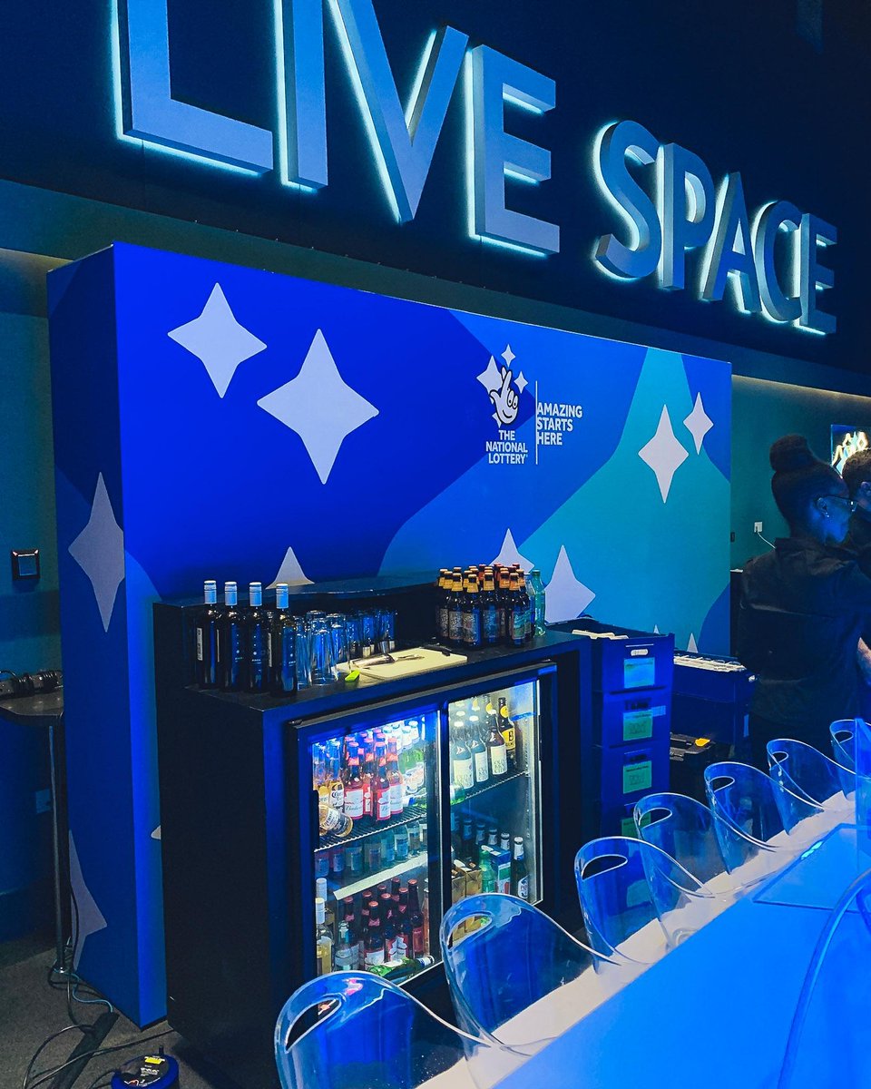 A last minute addition! This bar back wall was all produced in-house. #exhbitions #displays #print