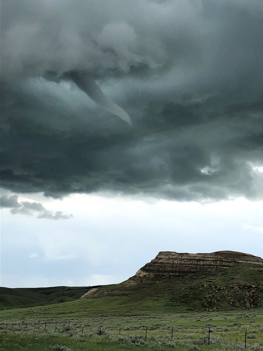 NickTheBody's tweet photo. Amazing photo taken over Castle Butte at 1450 today. Credit to Laura Gendall, amateur funnel cloud chaser extraordinaire. #skstorm @TornadoGreg @cgphotography @jaclahn https://t.co/bQc7yRVbqV