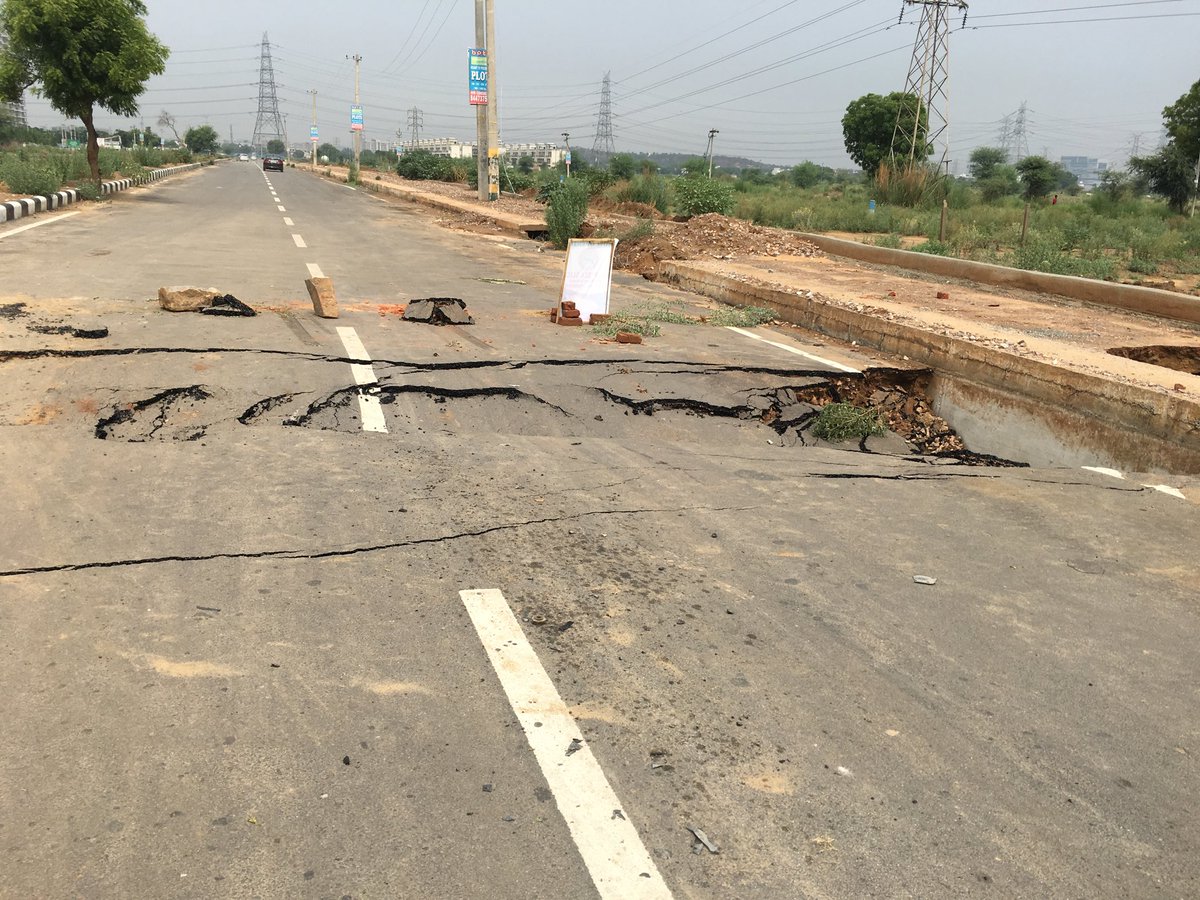 virenderd's tweet image. Road caved in both sides of the road after yesterday’s rain at Sector 70A, Gurugram ⁦@cmohry⁩ ⁦@DEEPAKKAHUJA⁩ ⁦@TrafficGGM⁩