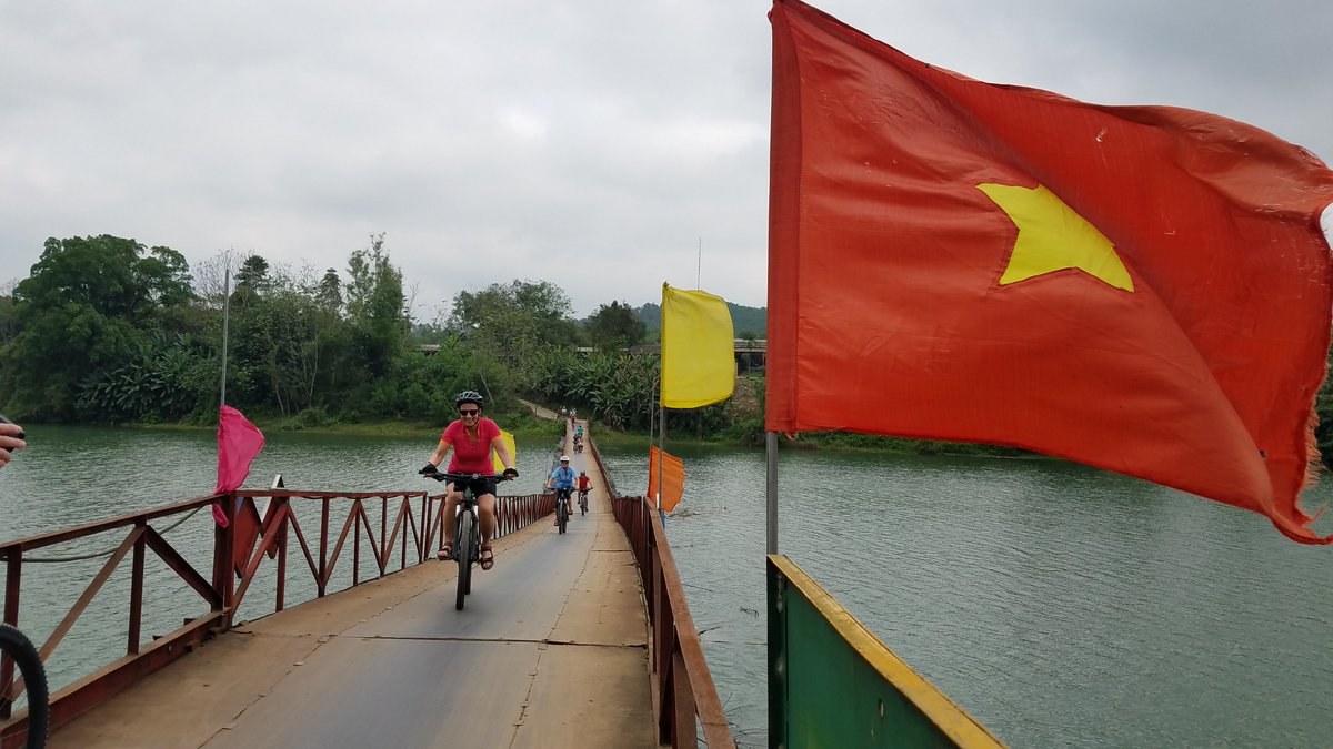 #Cycling across a #river #bridge near Hue in Central #Vietnam. At @haivenuvietnam we talk to local people, take local roads, try local foods, use local guides. Contact us for #LocalPerspective
#bicycle #ontheroad #outsideisfree #optoutside #getoutside
#huecity #bridgesofinstagram