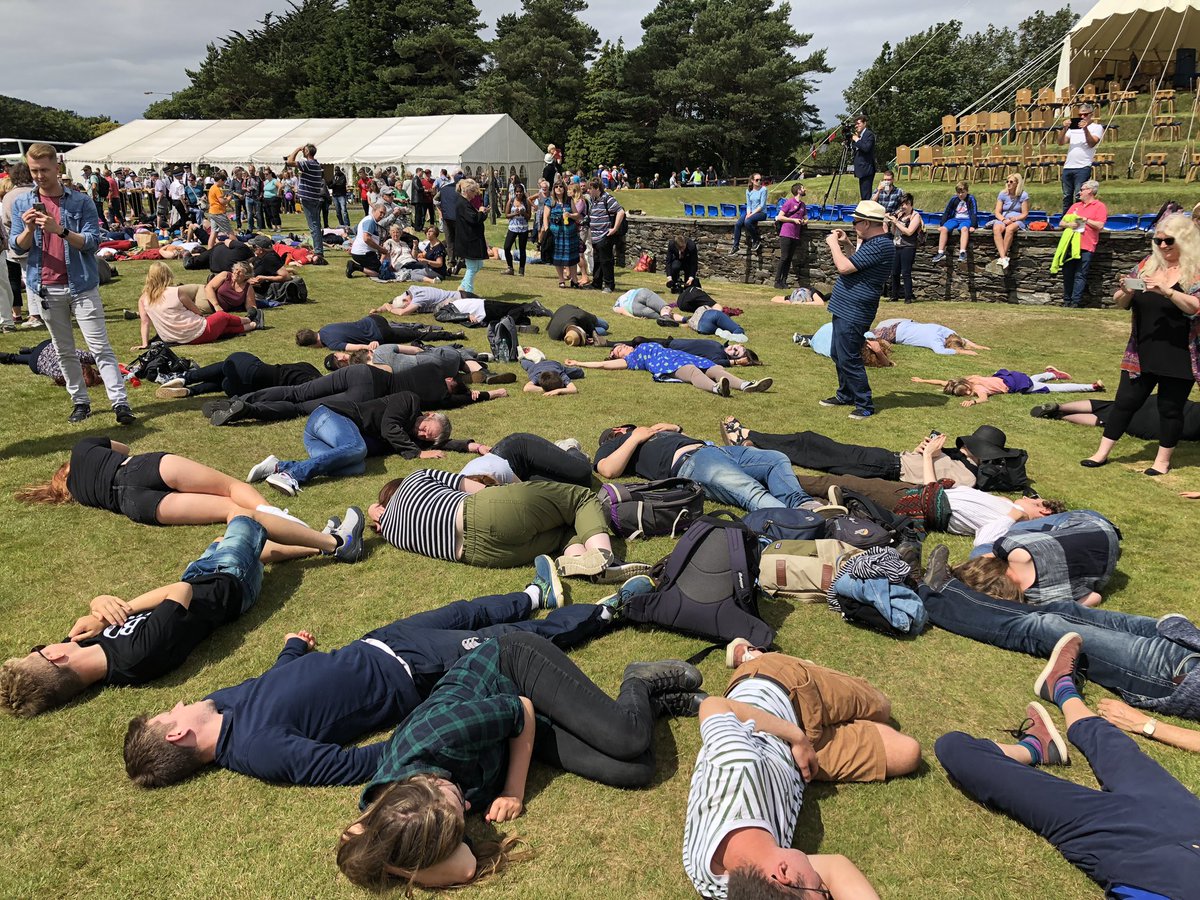 ManxRadio's tweet photo. A number of people at Tynwald today staged a flash mob “die in” in protest at climate change. https://t.co/WyFOKSSHcq