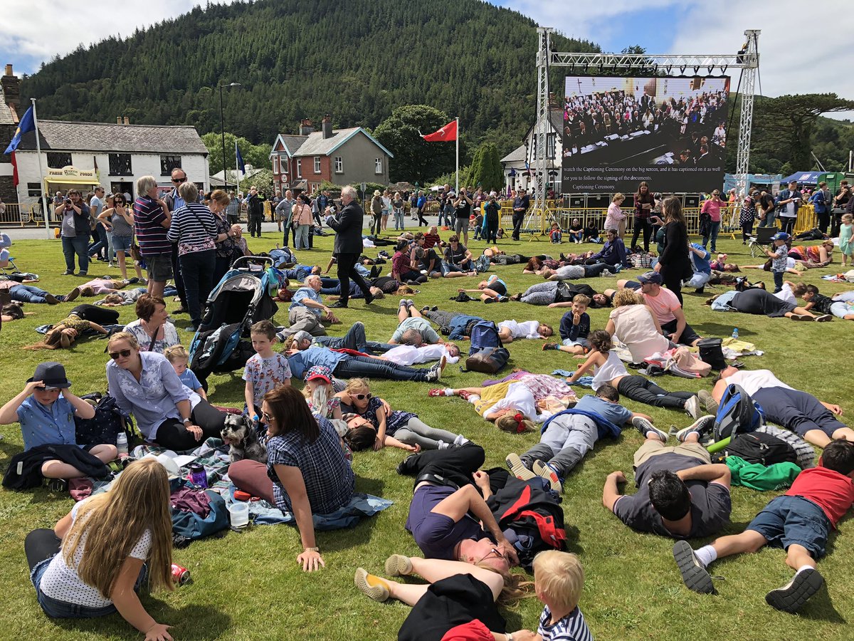 ManxRadio's tweet photo. A number of people at Tynwald today staged a flash mob “die in” in protest at climate change. https://t.co/WyFOKSSHcq