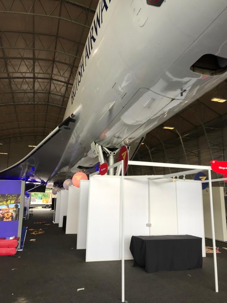 dimension8ltd's tweet photo. Today we're in Manchester Airport building the Proflight Training Event North which opens tomorrow.   Wow, that's an actual Concorde!  ⁦@ProFlightUK⁩ ⁦@ManchesterAirp⁩ https://t.co/kh7qRC6uW1