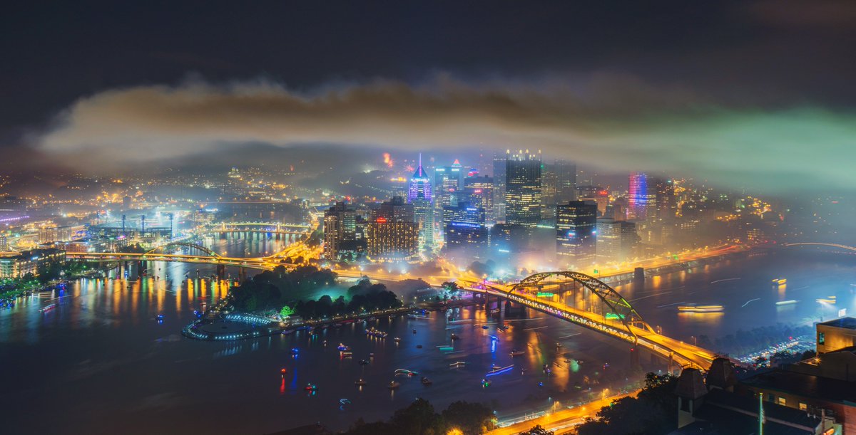 DaveDiCello's tweet photo. While the fireworks show last night in #Pittsburgh was certainly incredible, the scene directly after it wasn't too shabby either. Smoke from the grand finale engulfed downtown, creating eerie views above the light trails from passing boats on the river. https://t.co/ju51WpMI3c