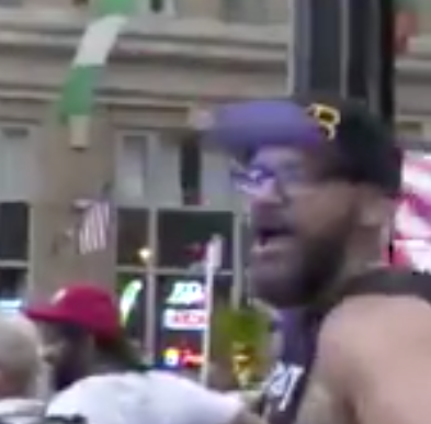 MCmuckraker's tweet photo. Here's a member of Proud Boys, a right-wing group that advocates political violence, wearing a Detroit T-shirt. Can you help identify him? His employer may want to know about his extremist beliefs. https://t.co/WzJbMlBXla