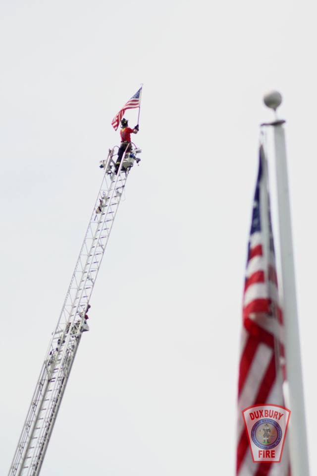 DXFD Firefighter flying the #AmericanFlag proudly on #july4th from 105’ up at the top of Ladder 1! Spread this across the US! #NeverForget #UnitedStatesOfAmerica #StarsandStripes