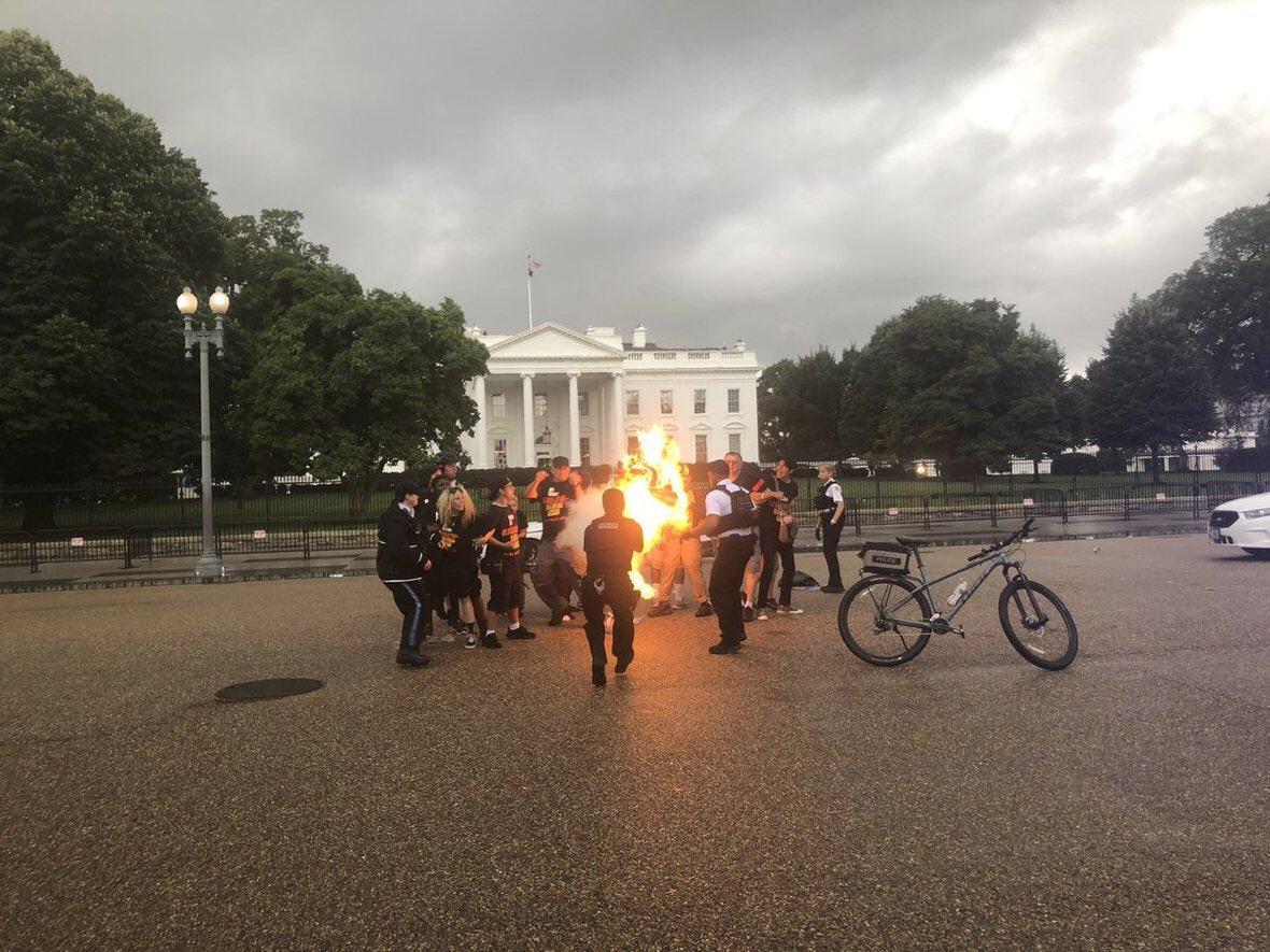 2 people arrested after burning American flag on Pennsylvania Ave.