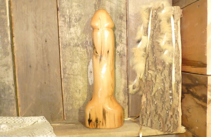 Girl fucks ancient wooden statue