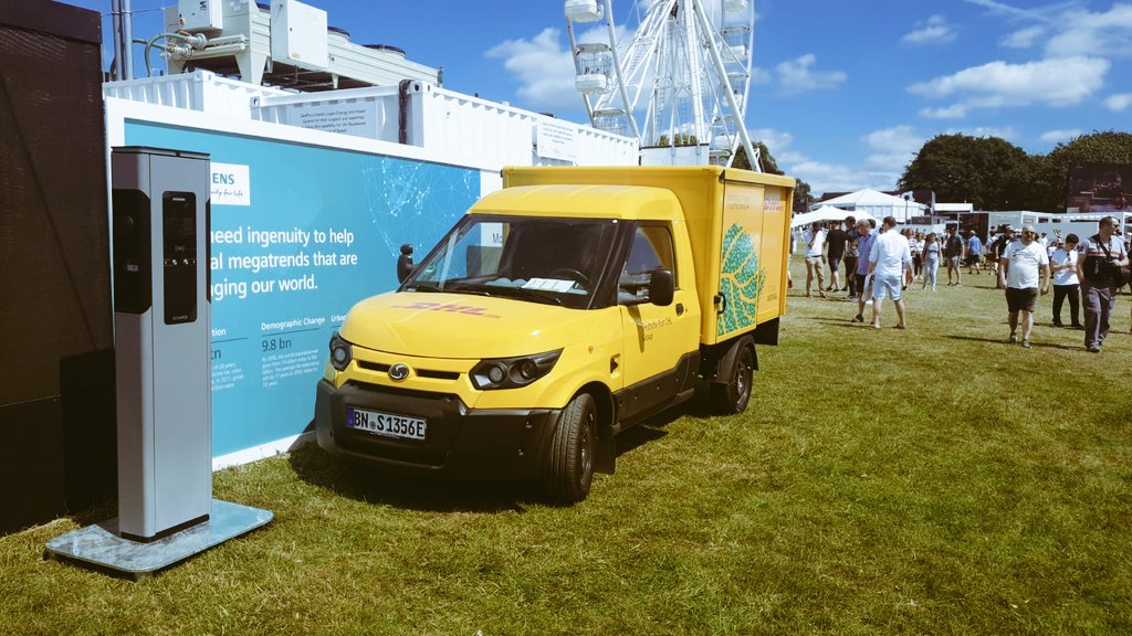 geo_pura's tweet photo. Giving the DHL fleet a 100% emissions free top up here at #FOS #EVWithoutLimits #IngenuityMoments https://t.co/YZdmcNJ5sC