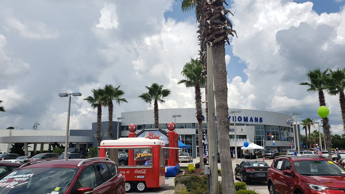 your_ford's tweet image. It is a beautiful #saturday here in #daytonabeach we have the grill going, the radio station, a bounce house and the #cocacola drink trailer here today! Who is on their way to #garyyeomansford?